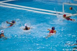 USA's Maggie Steffens scores on a 5 meter shot