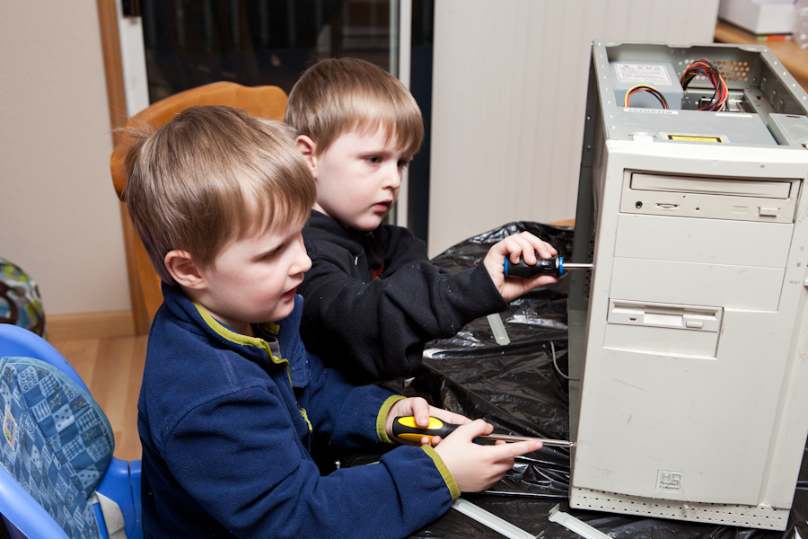 Andrew and Will disassembling an old computer