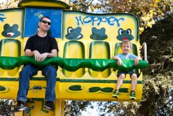 Adam and Andrew riding the Frog Hopper at Happy Hollow