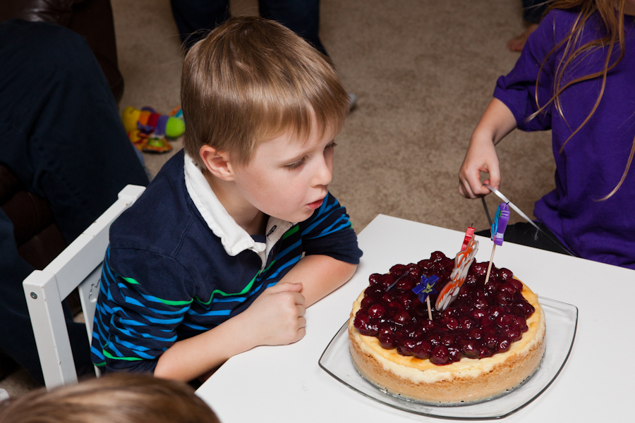 Andrew blows out his candles