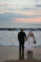 Cathy and Todd on the beach at sunset