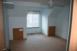 Bedroom 2 -- Note the pokemon curtain and "Keep Out -- Boy's Clubhouse" sign