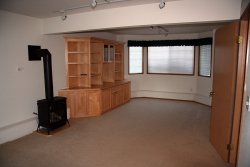 First floor living room w/ entertainment center