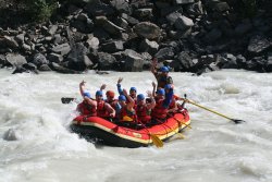 Tyler, Adam and Jessie rafting the Kicking Horse River