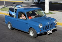 I fully expected 20 clowns to pour out of this vehicle. And what are those wheels, 11 inches?!