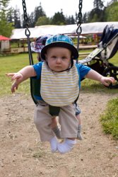 Andrew swinging at the park