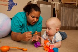 Simone teaches Andy to play the spoons