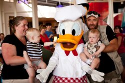 Bekki, Andy, Will and Grandpa Steve with Donald Duck