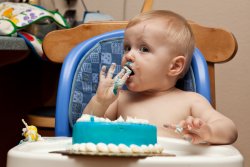 William daintily sampling the frosting