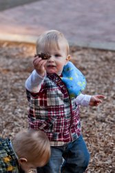 William presents a pinecone