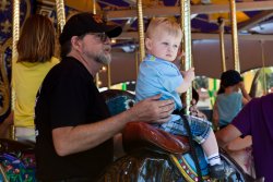 Andy riding the anteater with Grandpa Allen 2