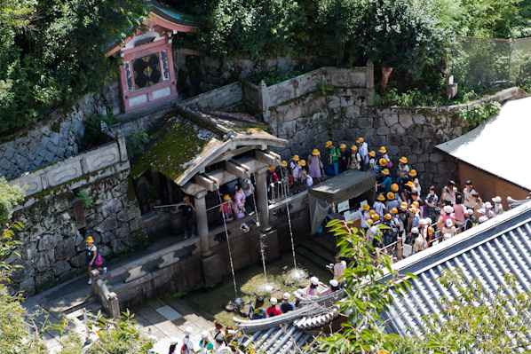 The yellow hats are all one tour group