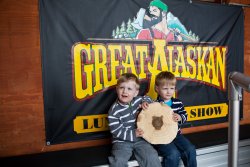 Will and Andrew show off their tree slice