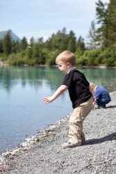 Will throws a rock in the lake