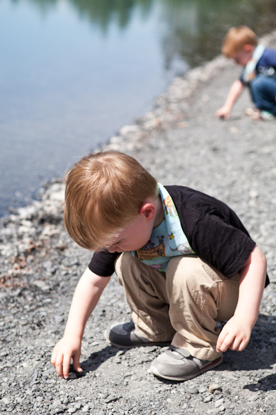 Will (and blurry Andrew) finding throwable rocks