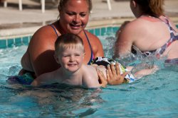 Andrew swimming with Auntie Jessie