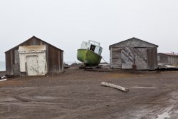 Barrow Boat Between Beach Buildings