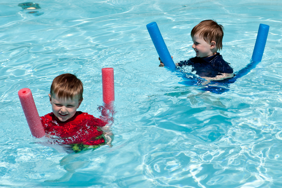 Will and Andrew ride pool noodles