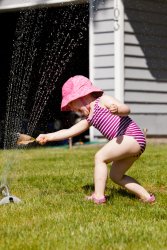 Kate in the sprinkler 2