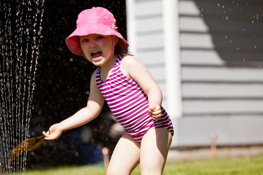 Kate in the sprinkler 4