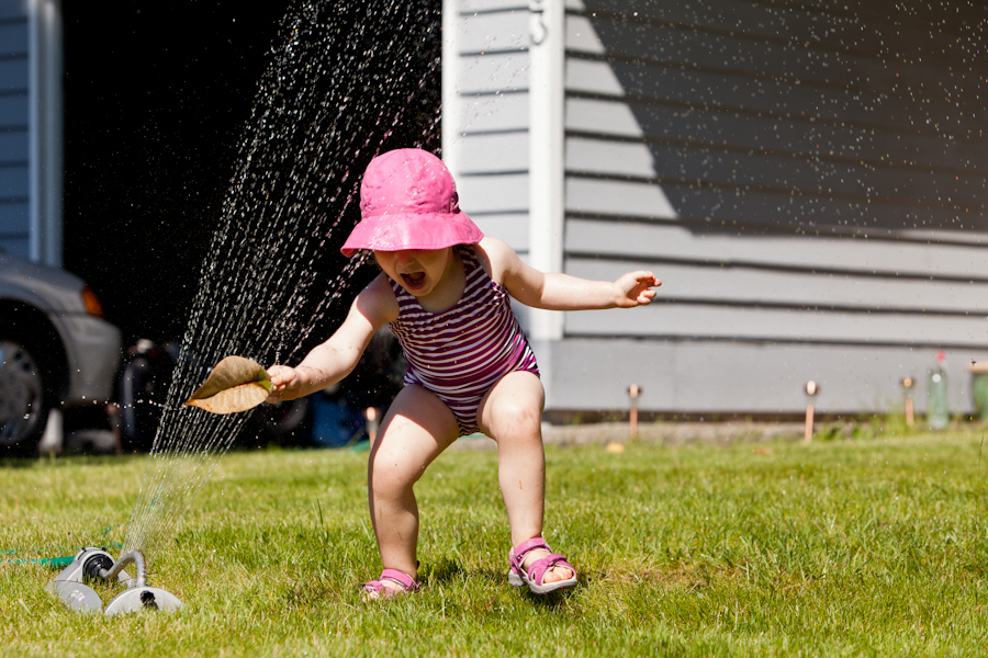 Kate in the sprinkler 7