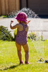 Kate in the sprinkler 8