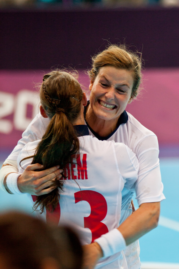 Norway celebrates after a goal in a quarterfinal Women's Handball match