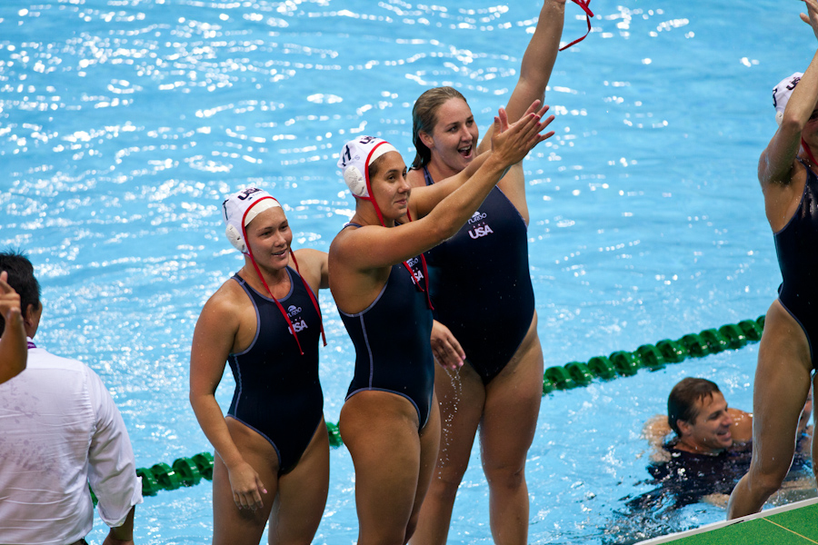 Courtney Mathewson, Annika Dries and Melissa Seidemann celebrate gold