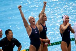 Lauren Wenger, Betsey Armstrong and Kelly Rulon celebrate gold